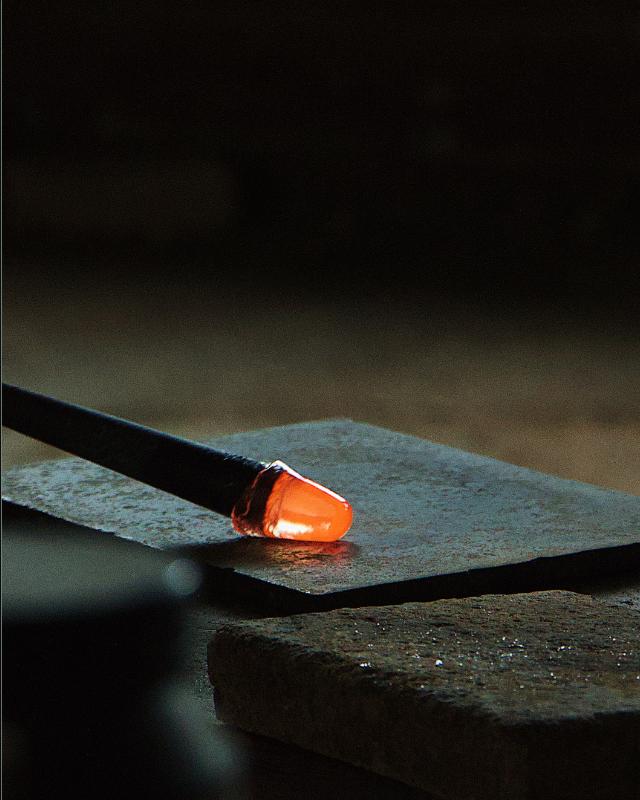 A glowing gather of molten Murano glass